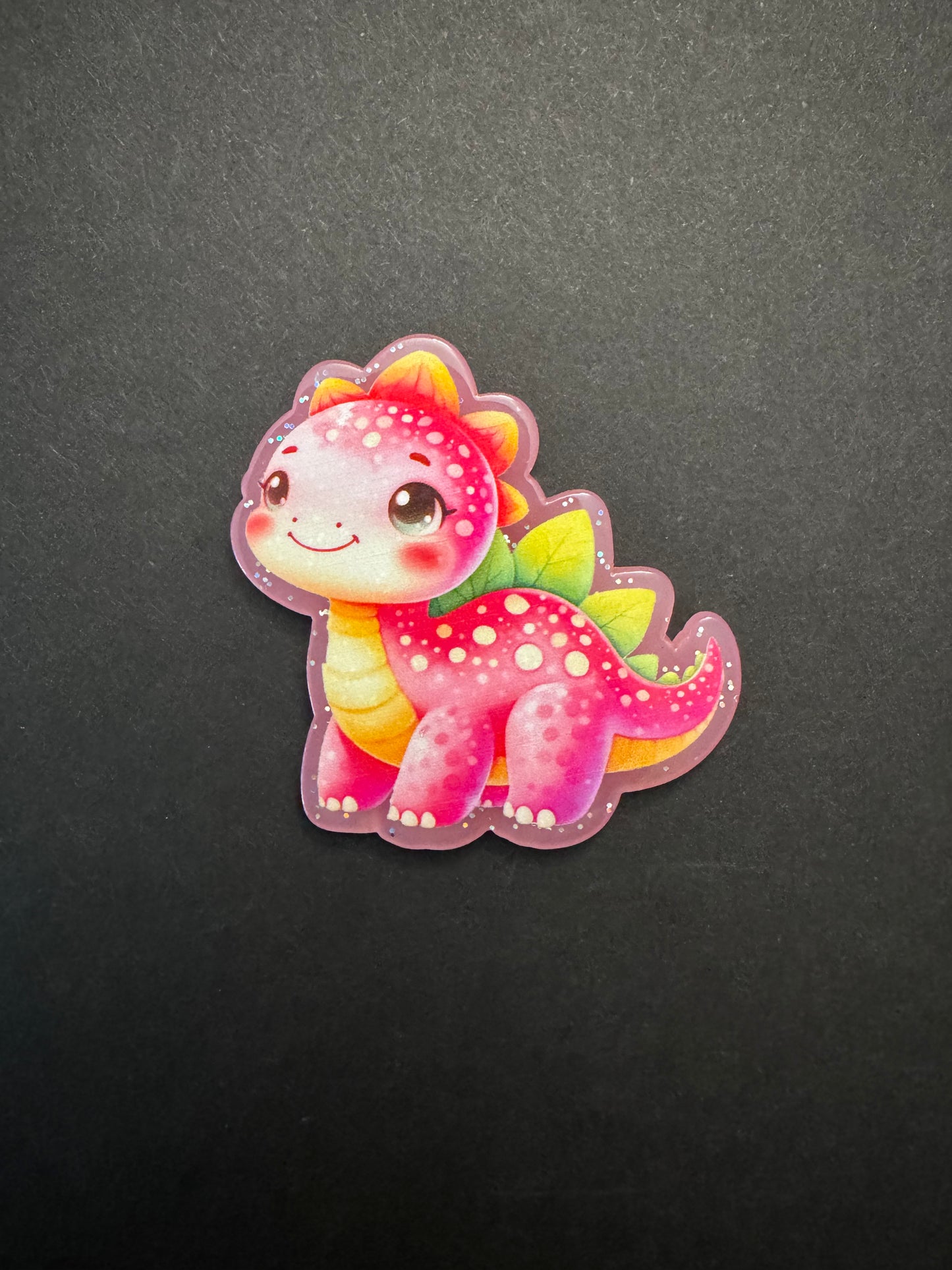 Dino badge reel