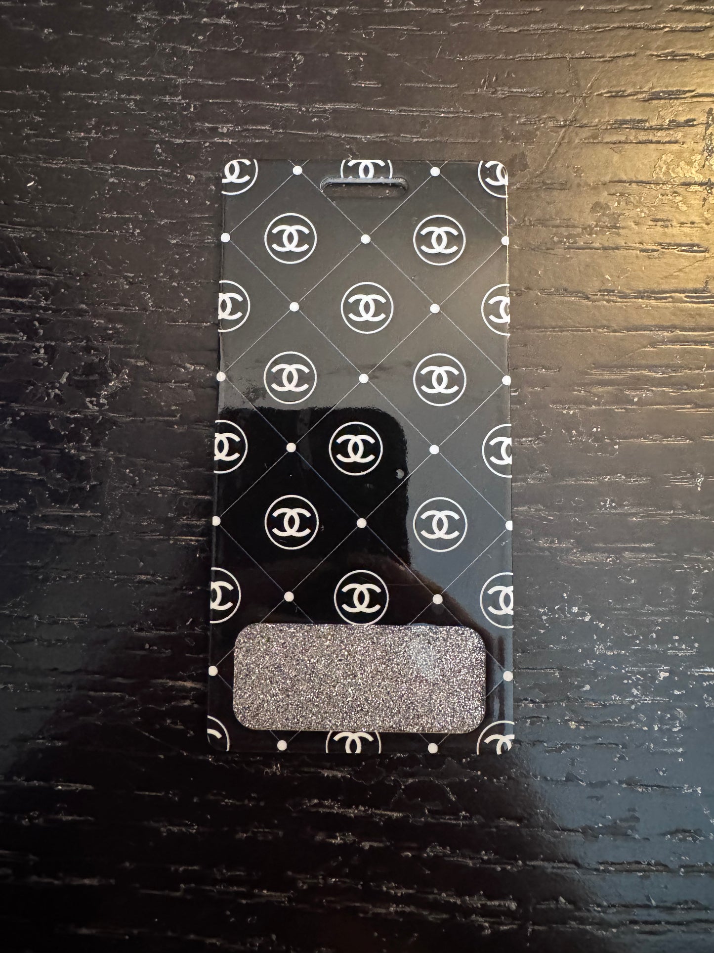 Chanel vertical badge buddy