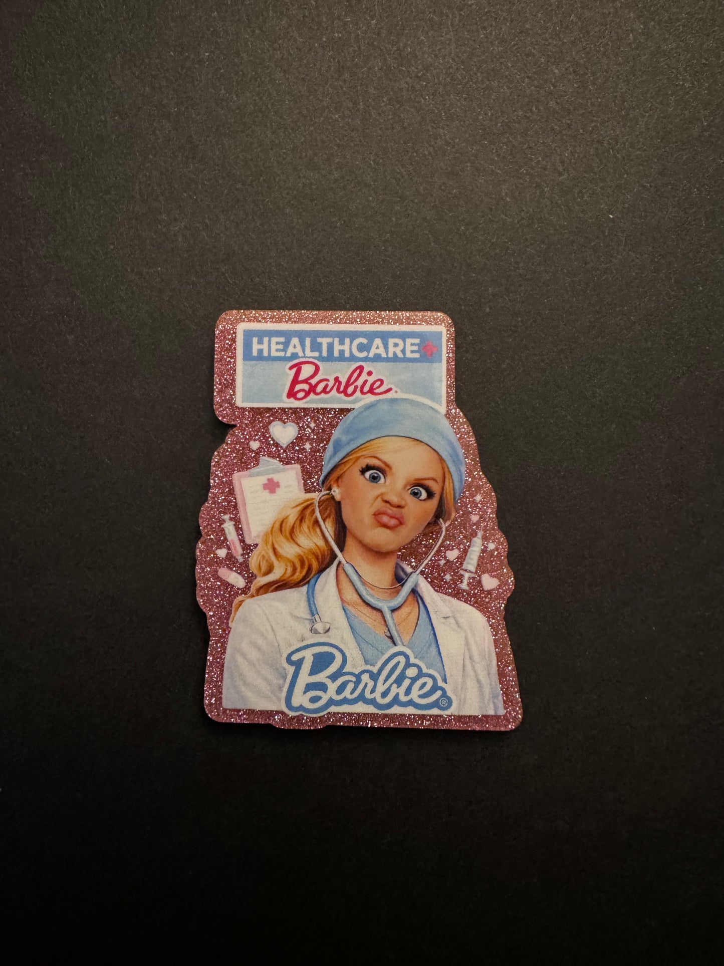 Barbie badge reel