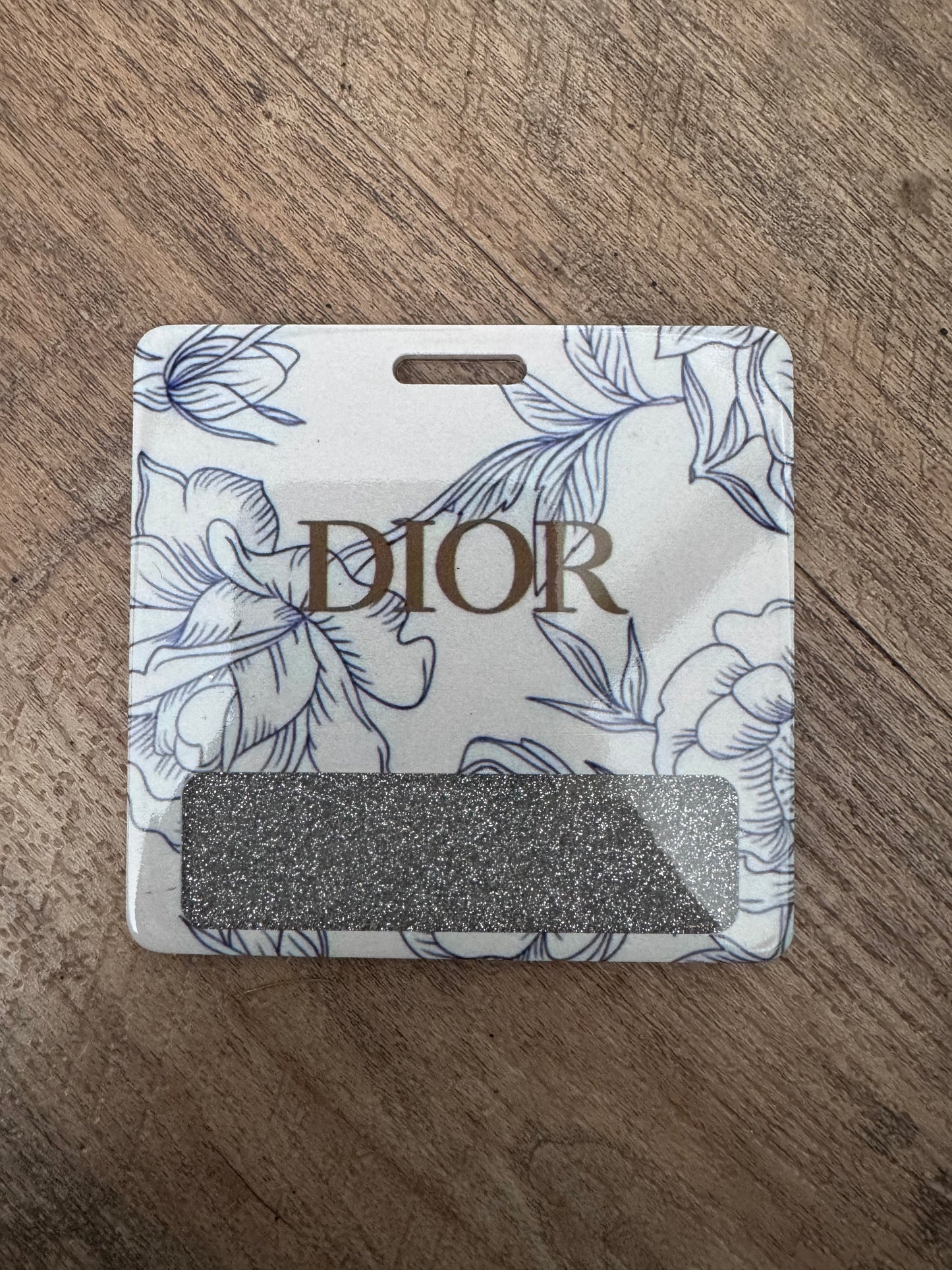 Dior badge buddy