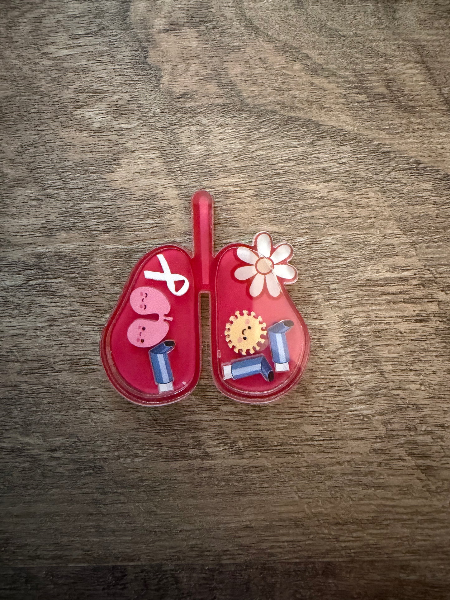 Lung shaker badge reel