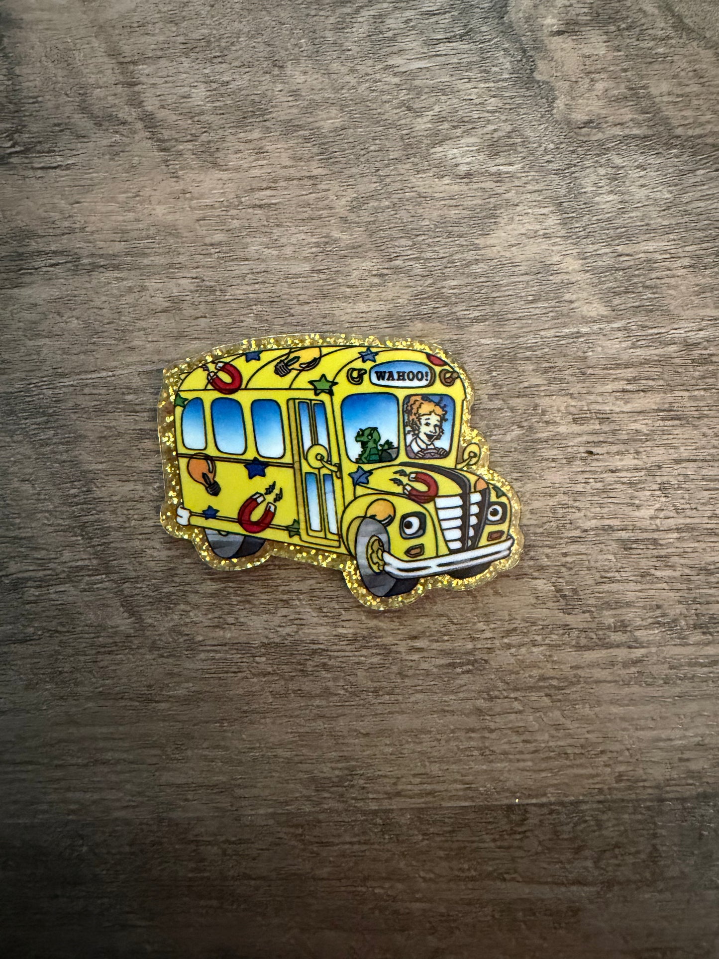 Magic school bus badge reel