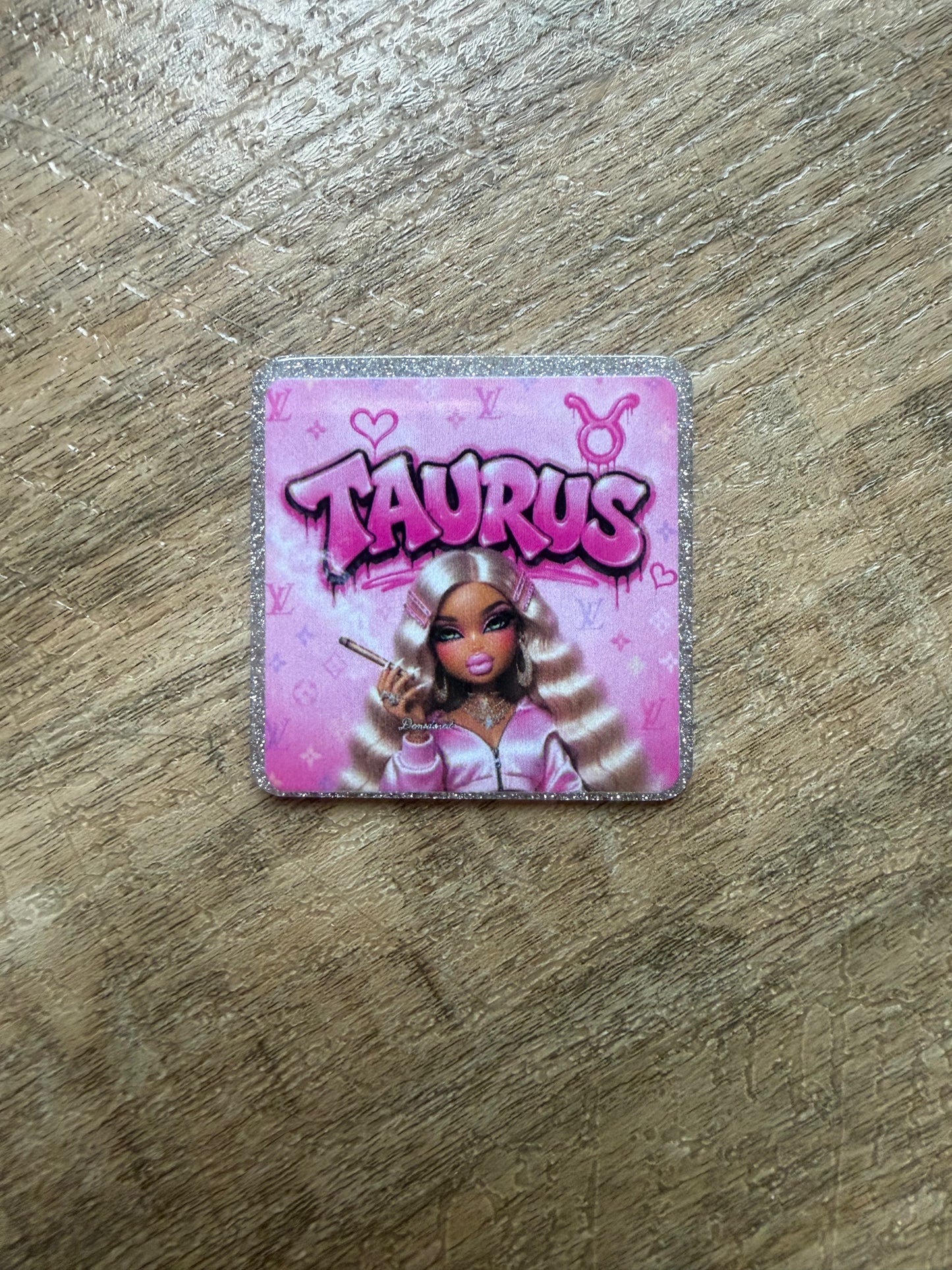 Taurus badge reel