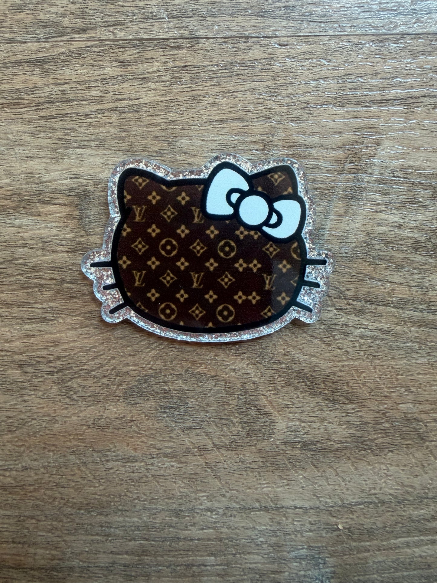 Hello Kitty LV badge reel