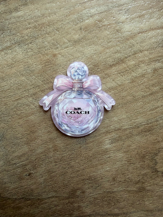 Coach badge reel