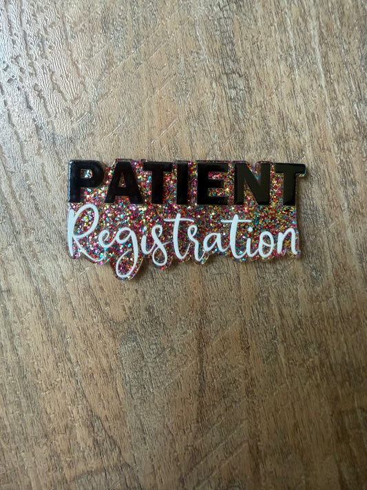 Patient registration badge reel