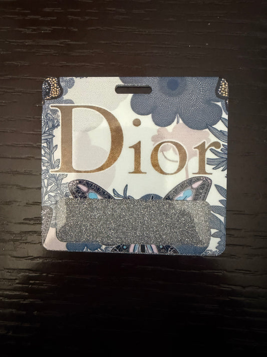 Dior badge buddy