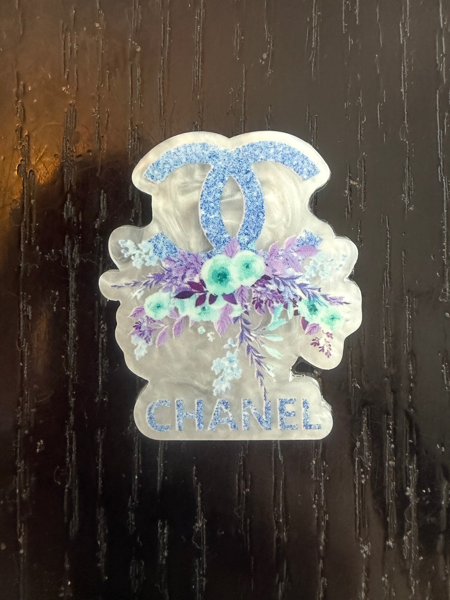 Chanel badge reel