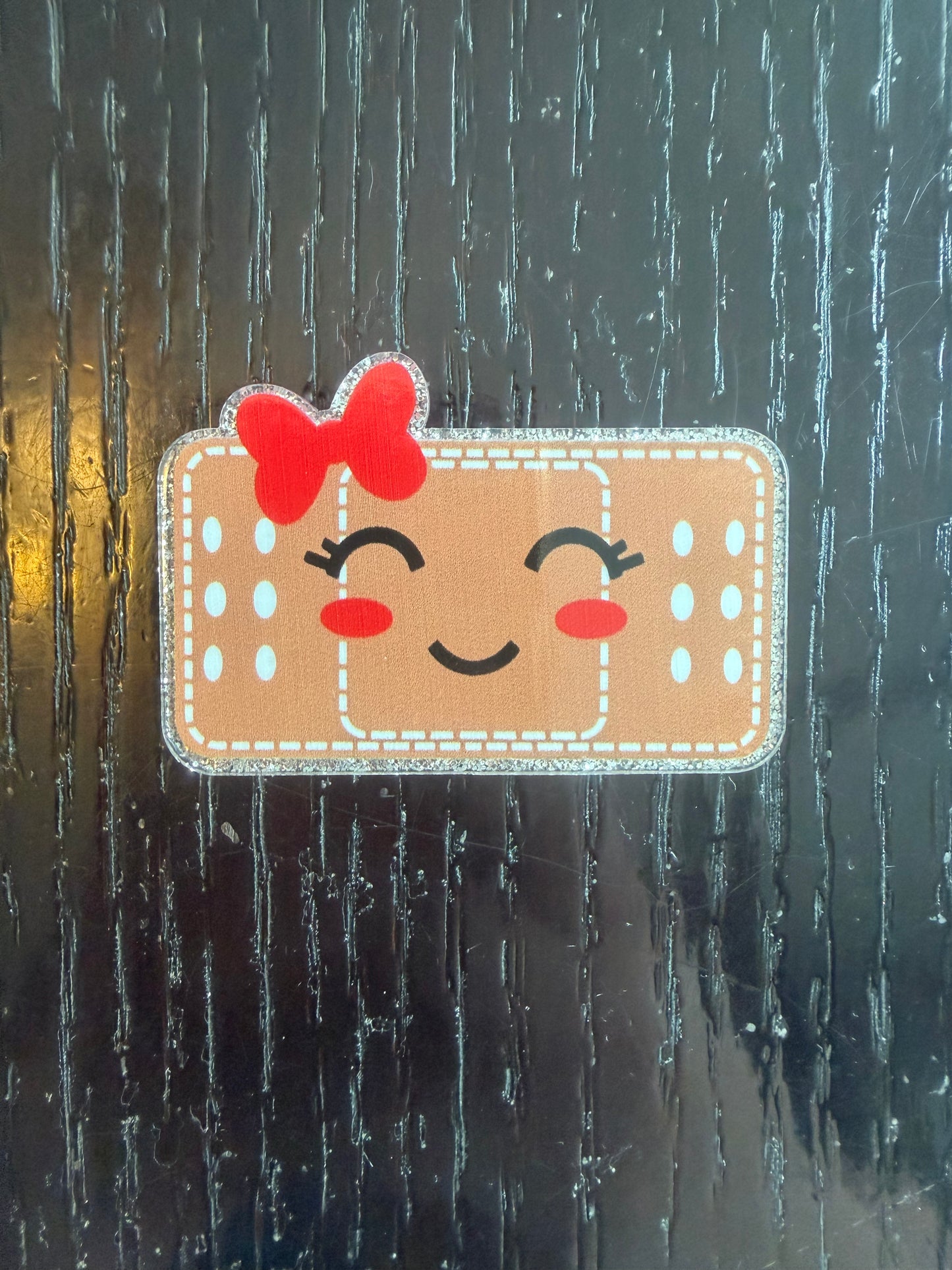 Bandaid badge reel