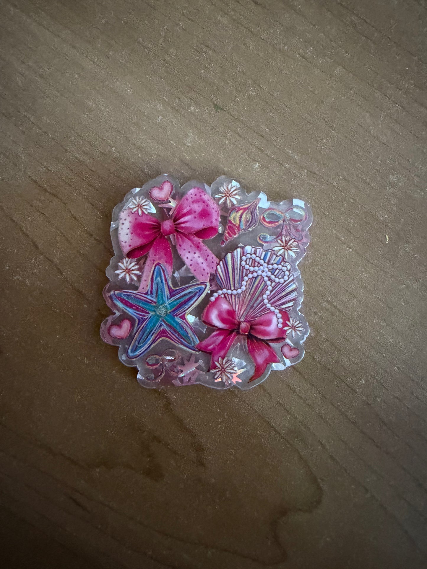 Seashell badge reel