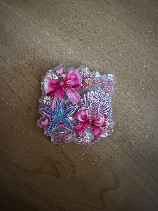 Seashell badge reel