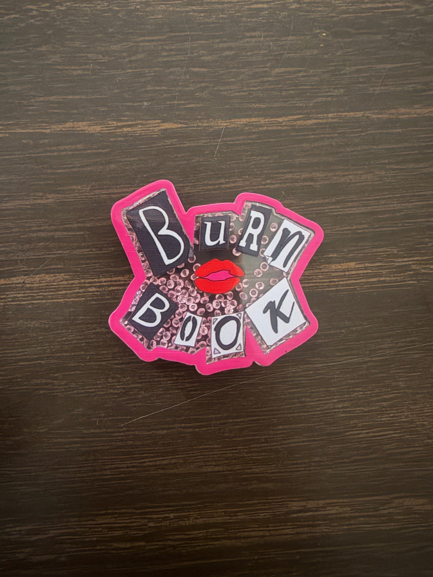 Burn Book shaker badge reel