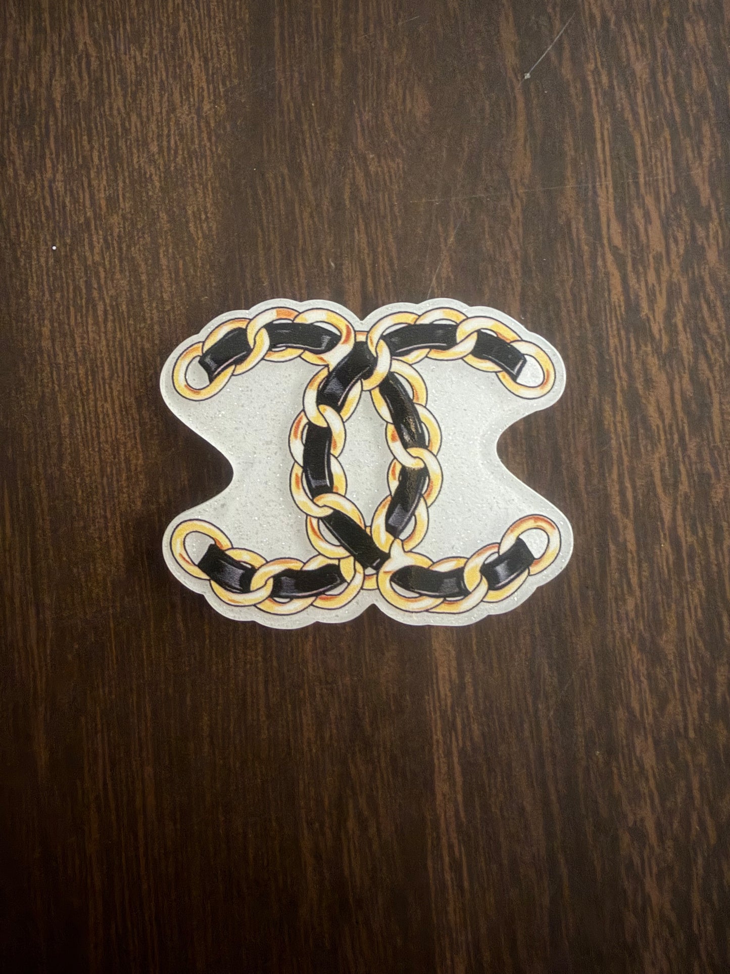 Chanel badge reel