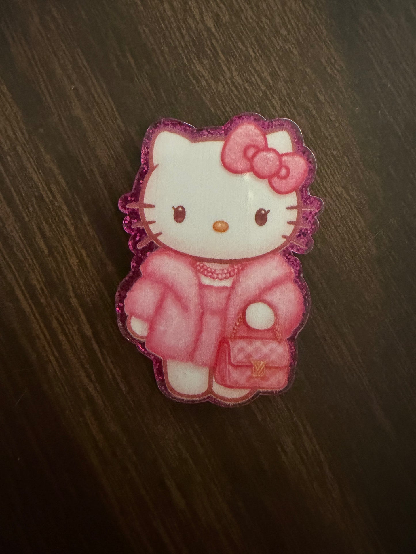 Hello Kitty LV badge reel