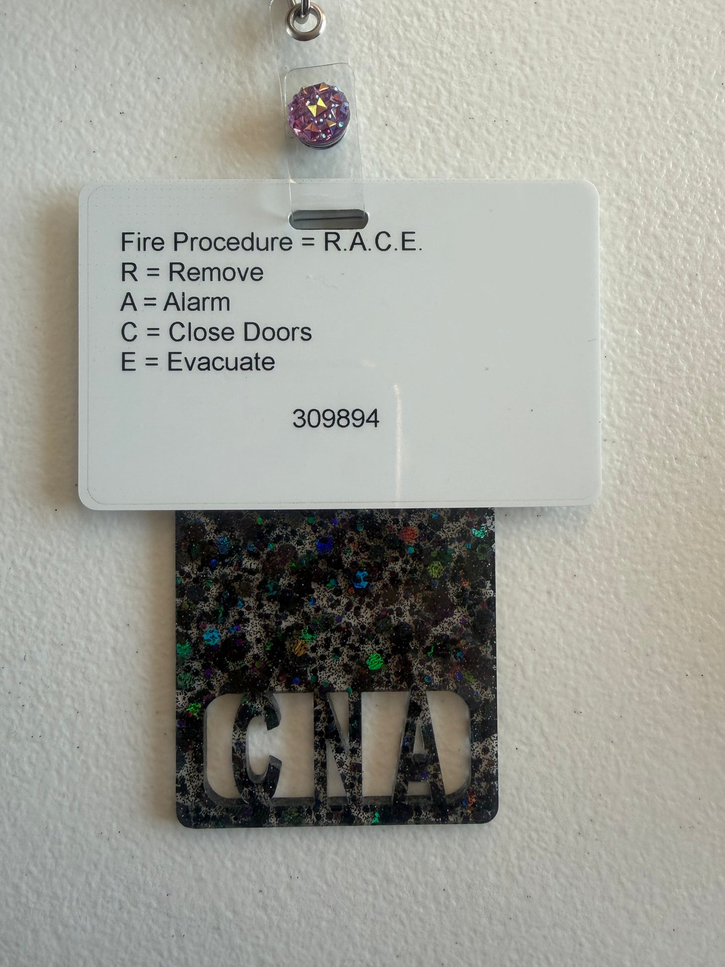 CNA vertical badge buddy (black glitter)
