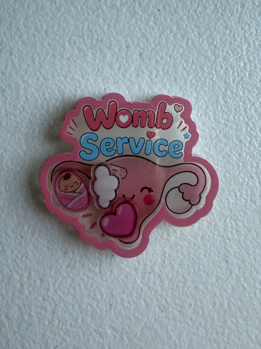Womb service shaker badge reel
