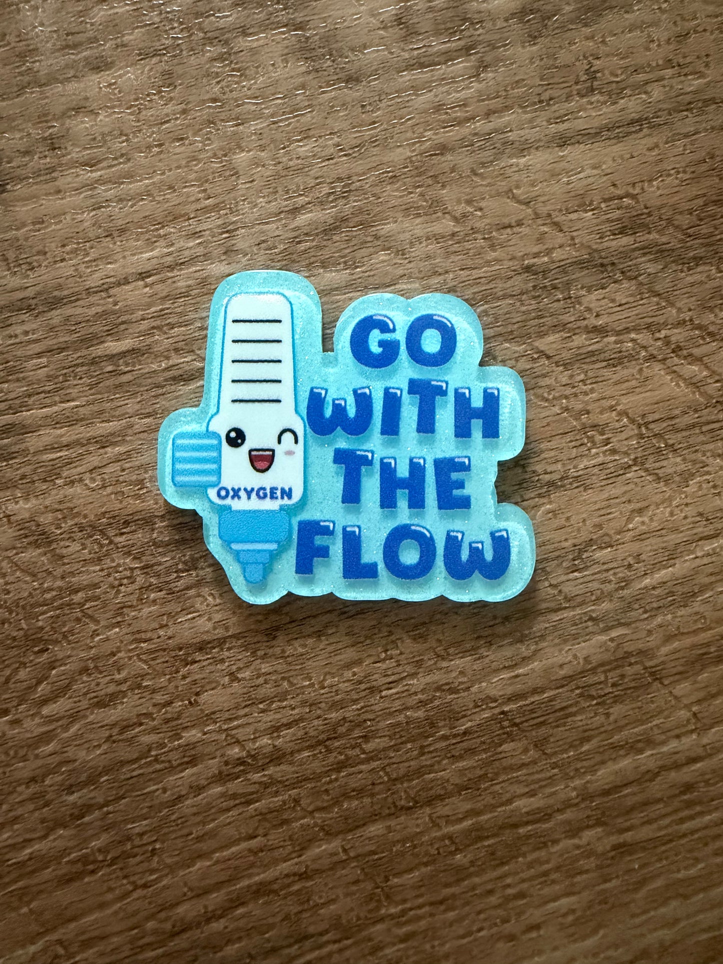 Go with the flow badge reel