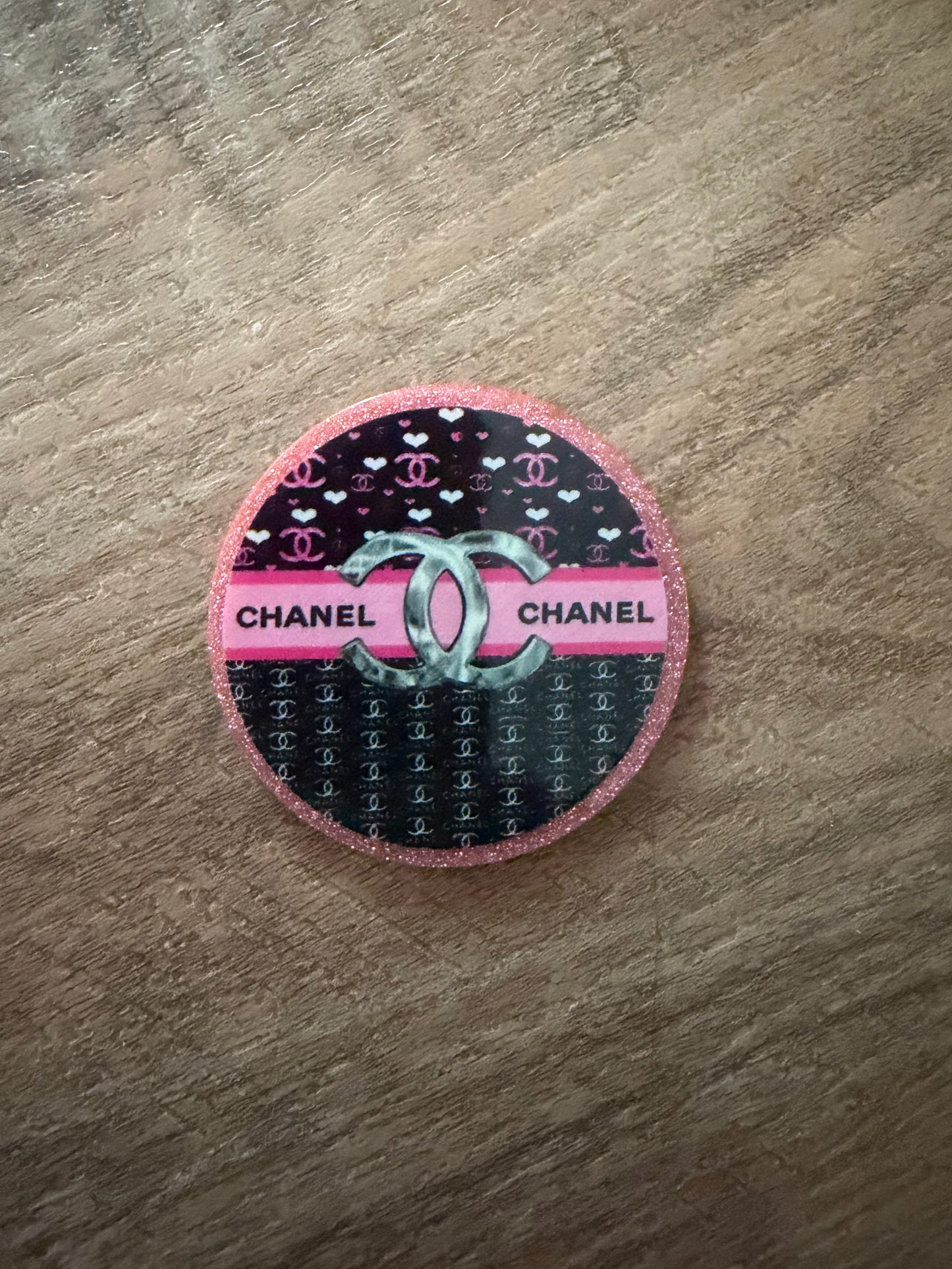 Chanel badge reel