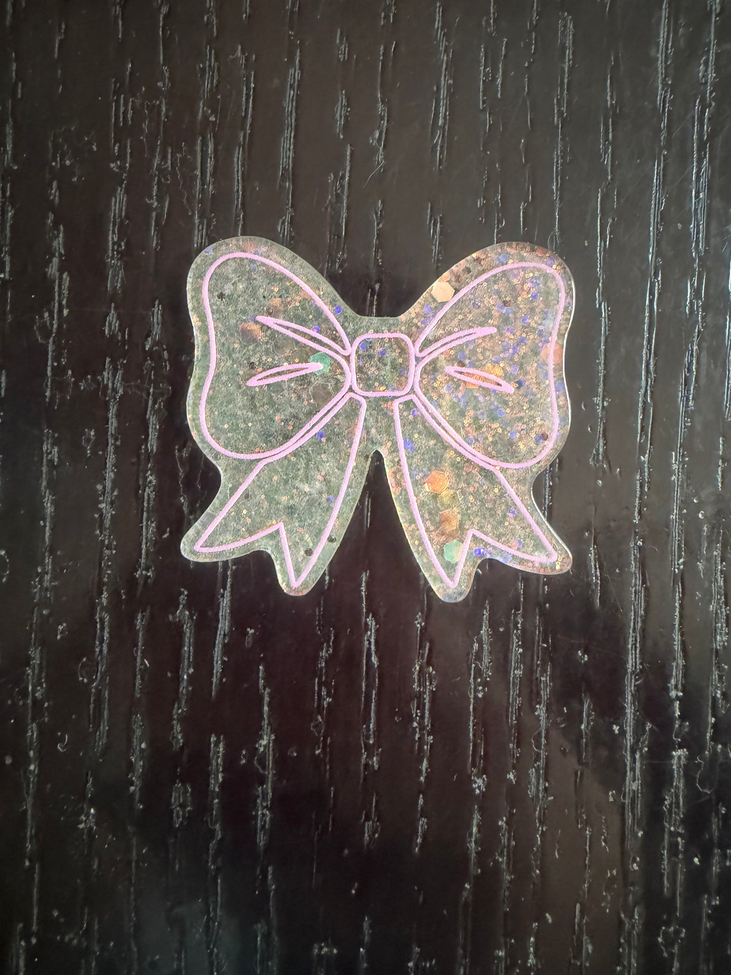 Bow badge reel
