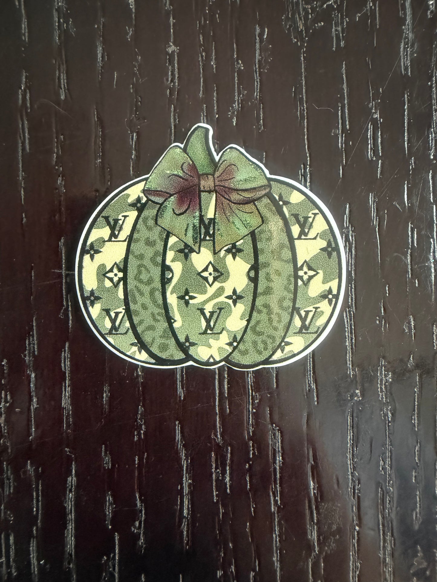 LV Pumpkin badge reel