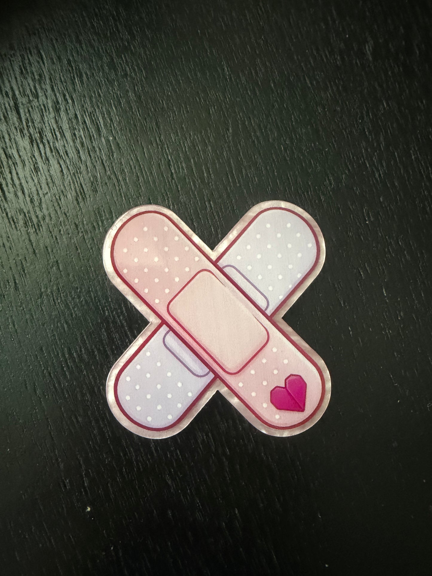 Bandaid badge reel
