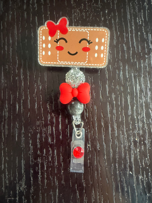 Bandaid badge reel