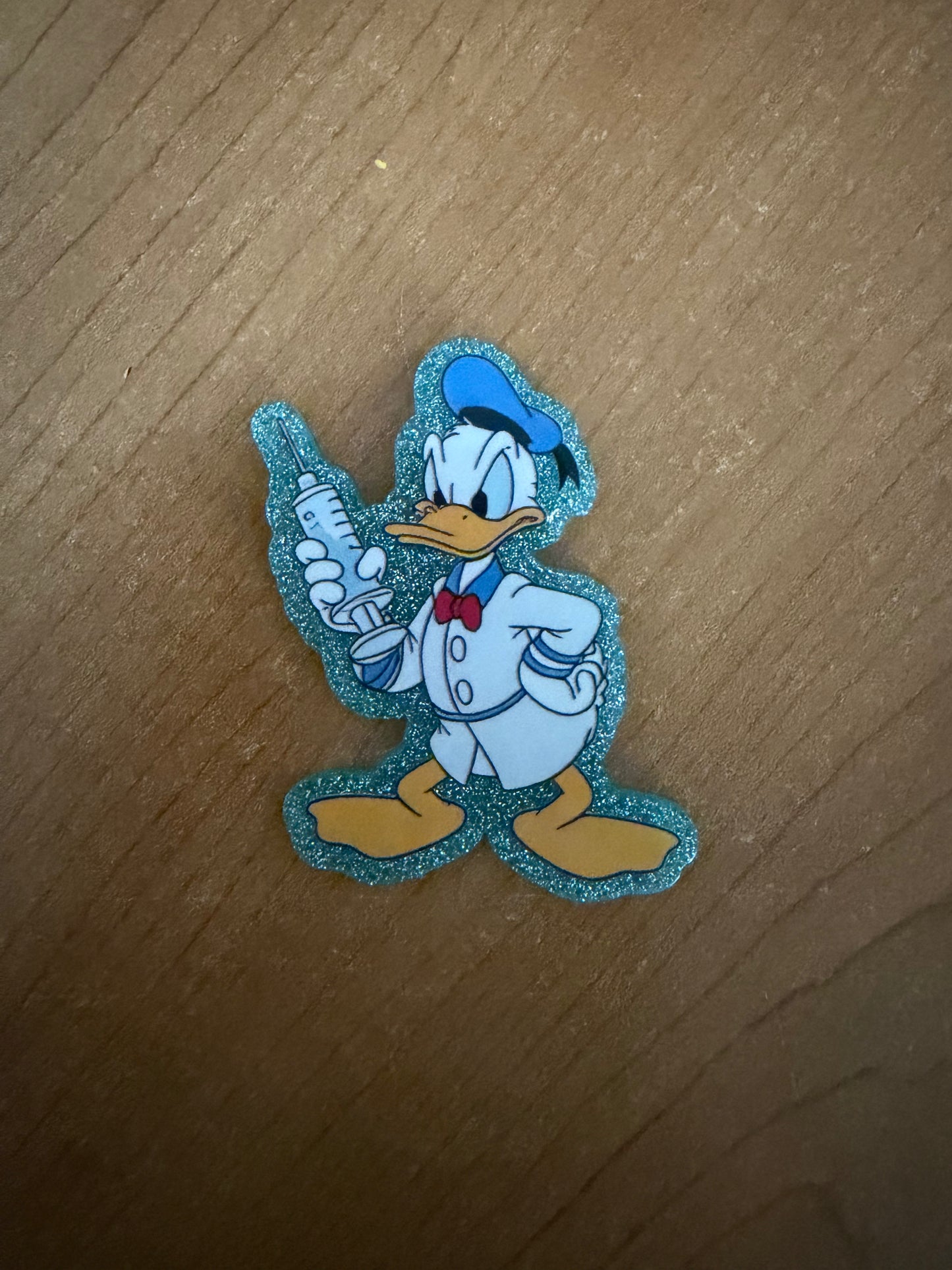 Donald Duck nurse badge reel