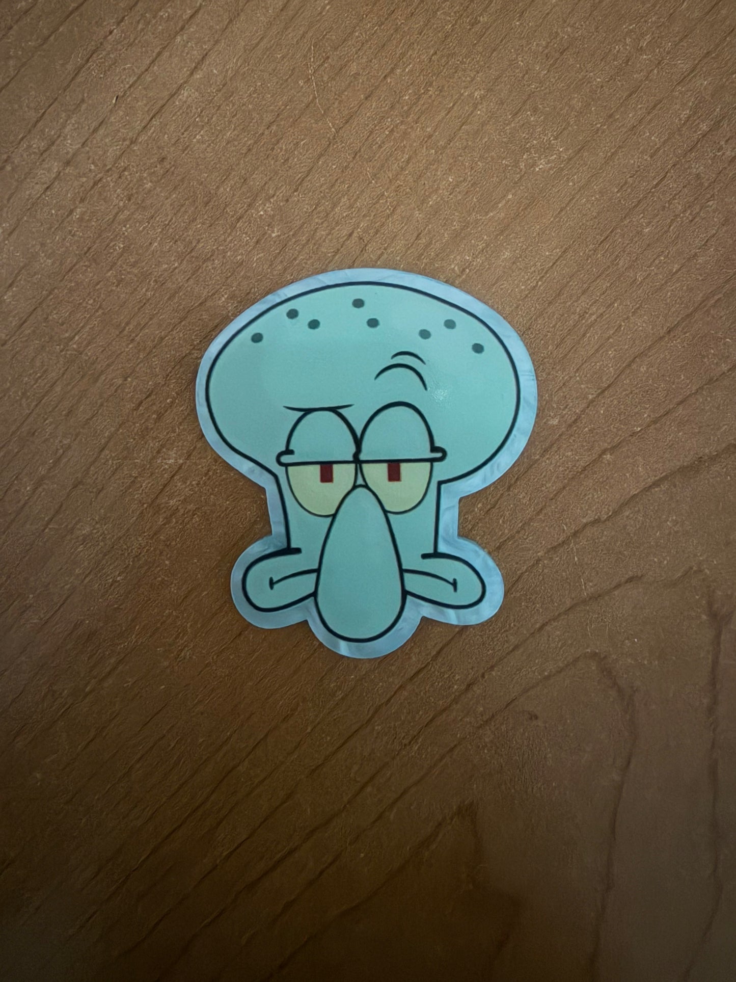 Squidward badge reel