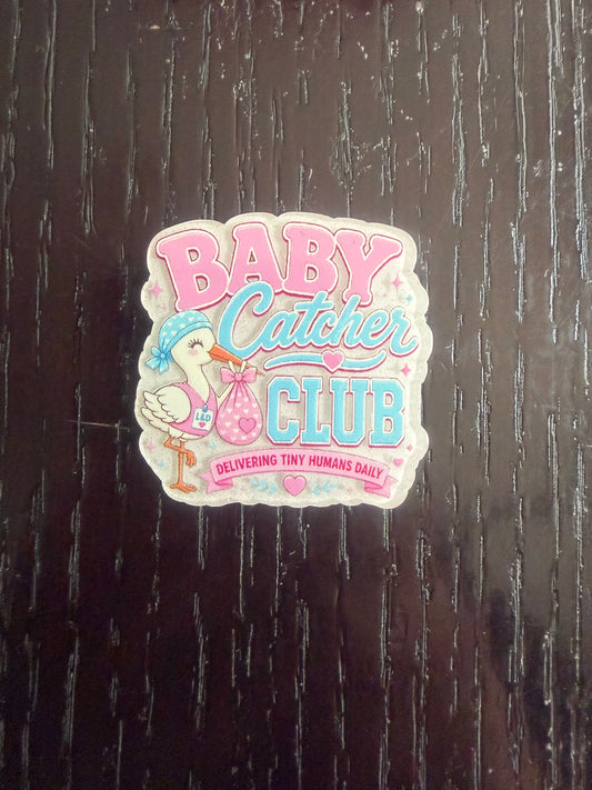 Baby catcher club badge reel