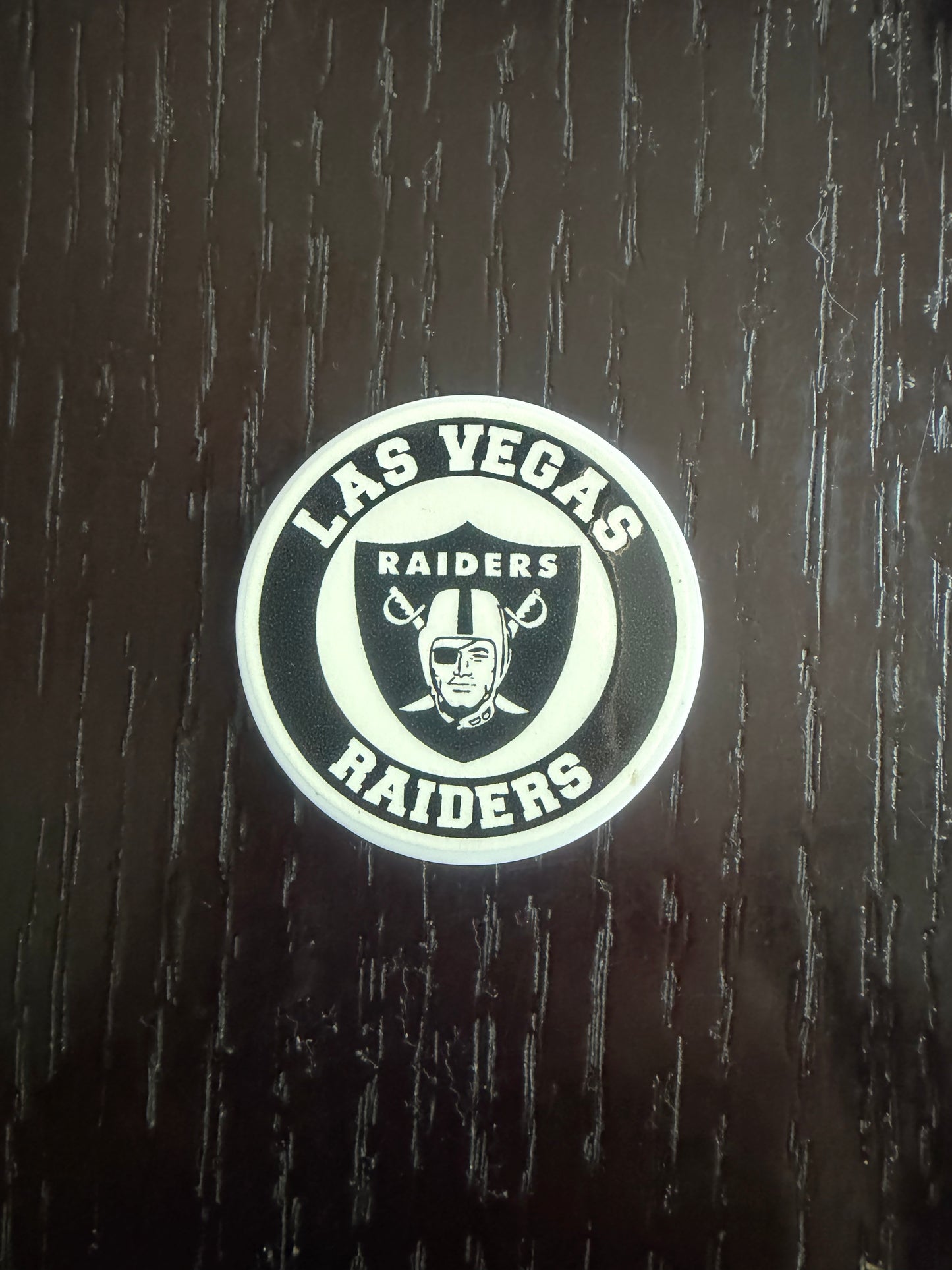 Raiders badge reel (no glitter)