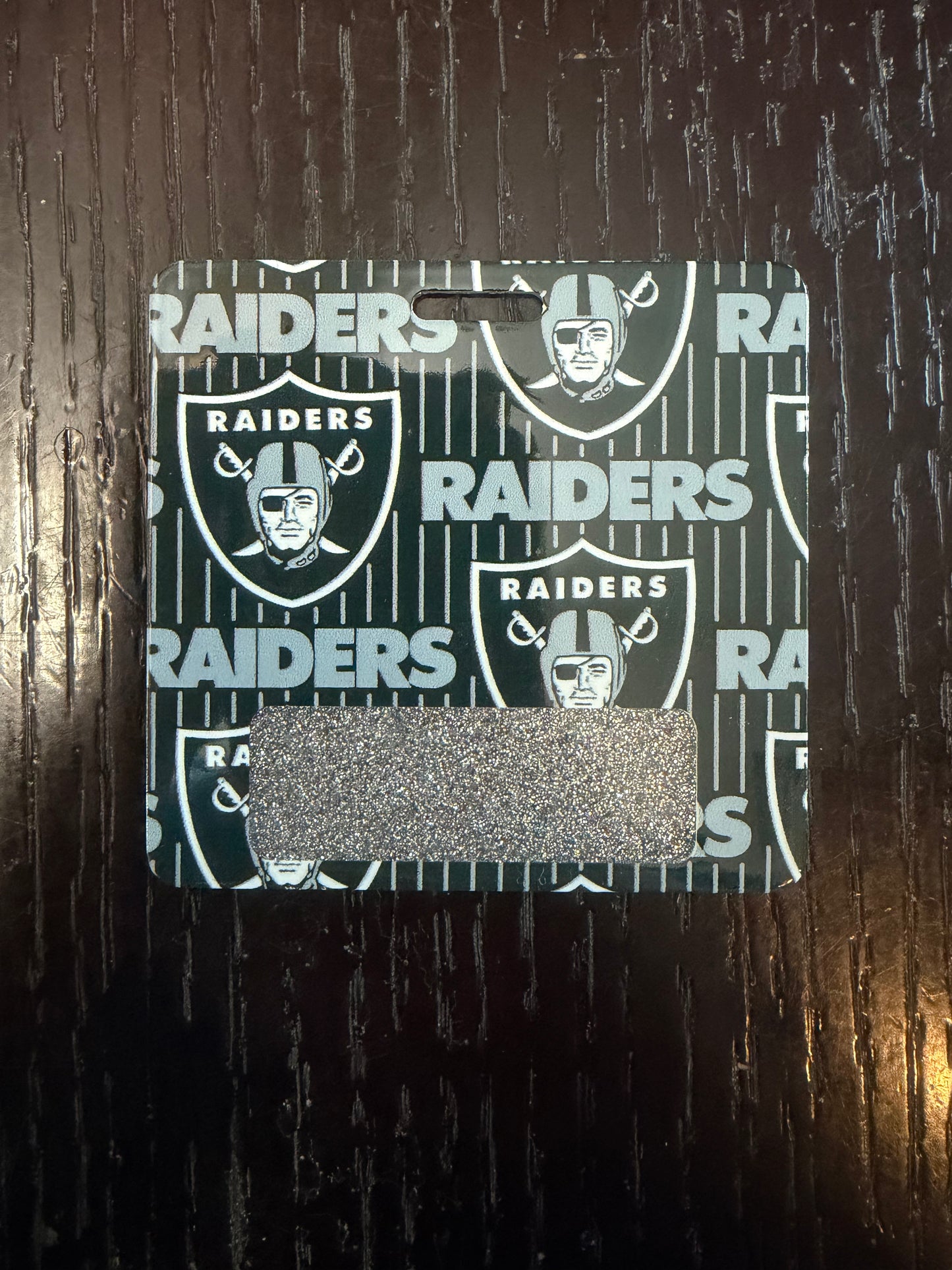 Raiders badge buddy