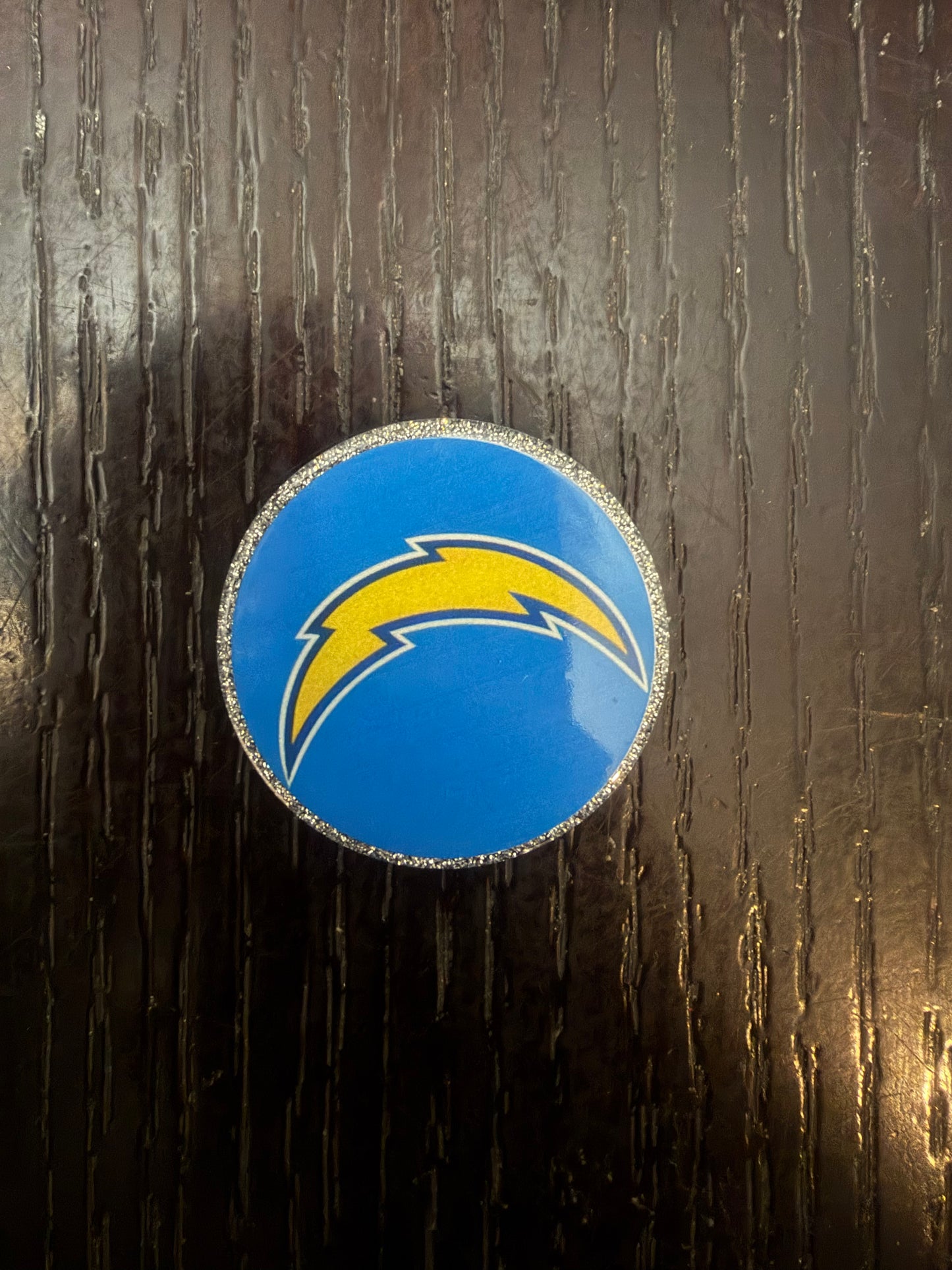 Chargers badge reel