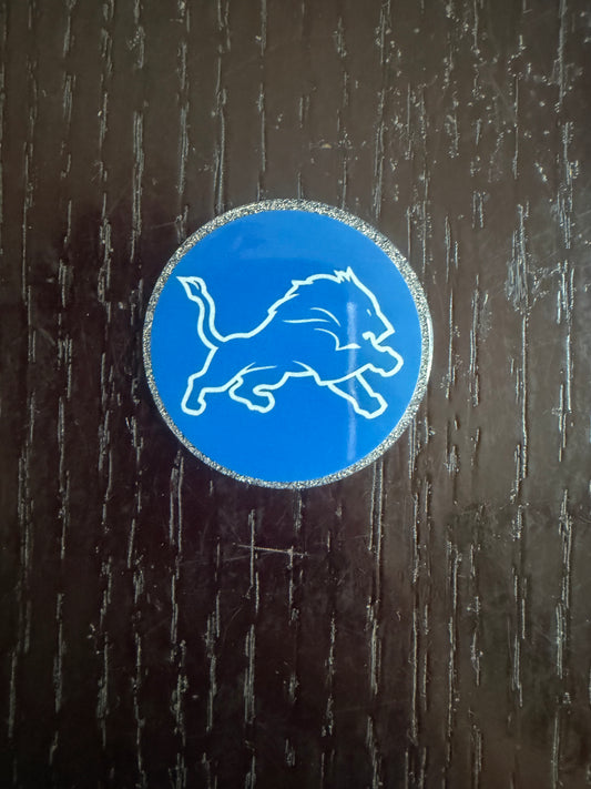 Lions badge reel