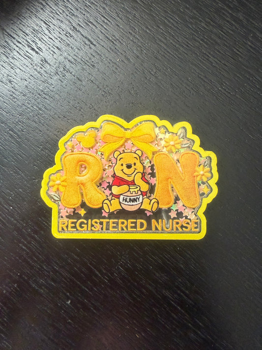 RN pooh shaker badge reel