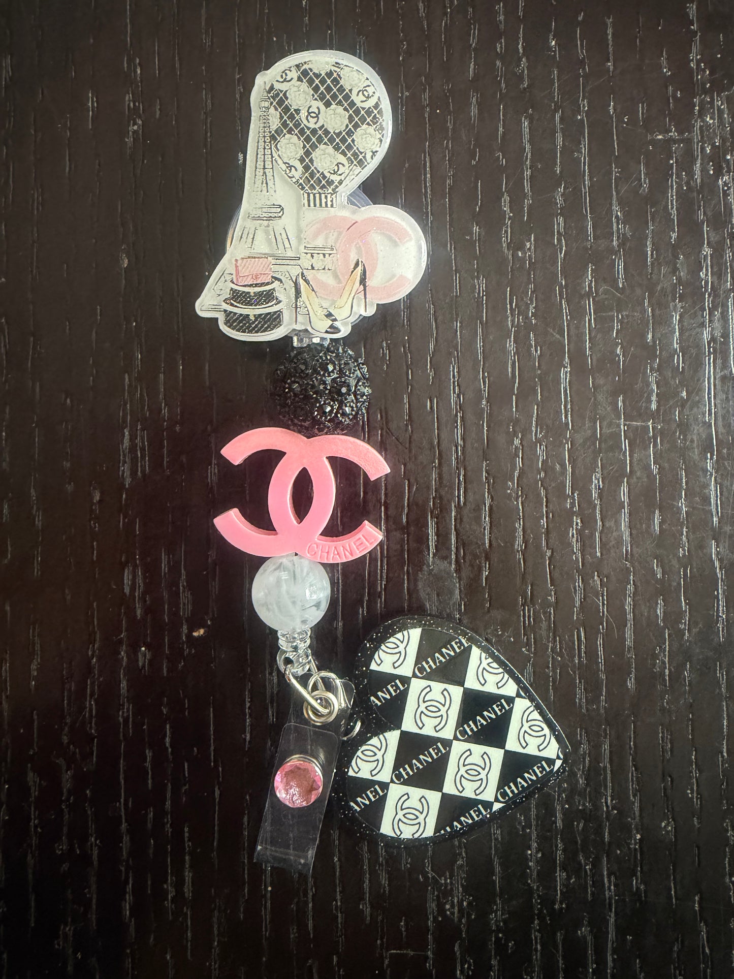 Chanel badge reel
