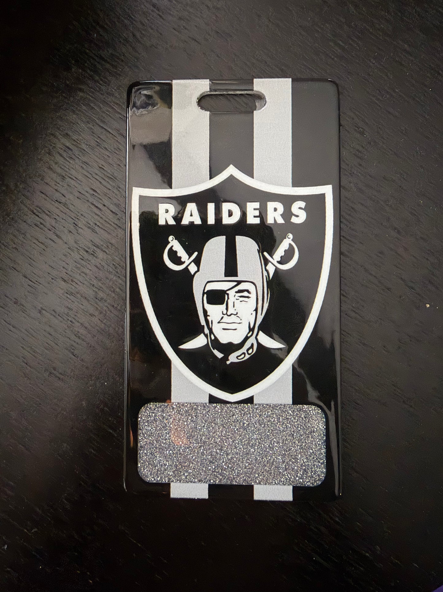 Raiders vertical badge buddy