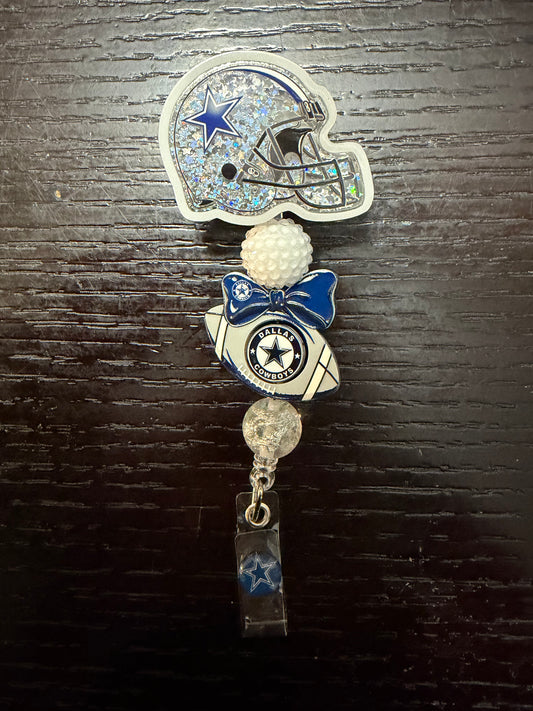 Cowboys shaker badge reel