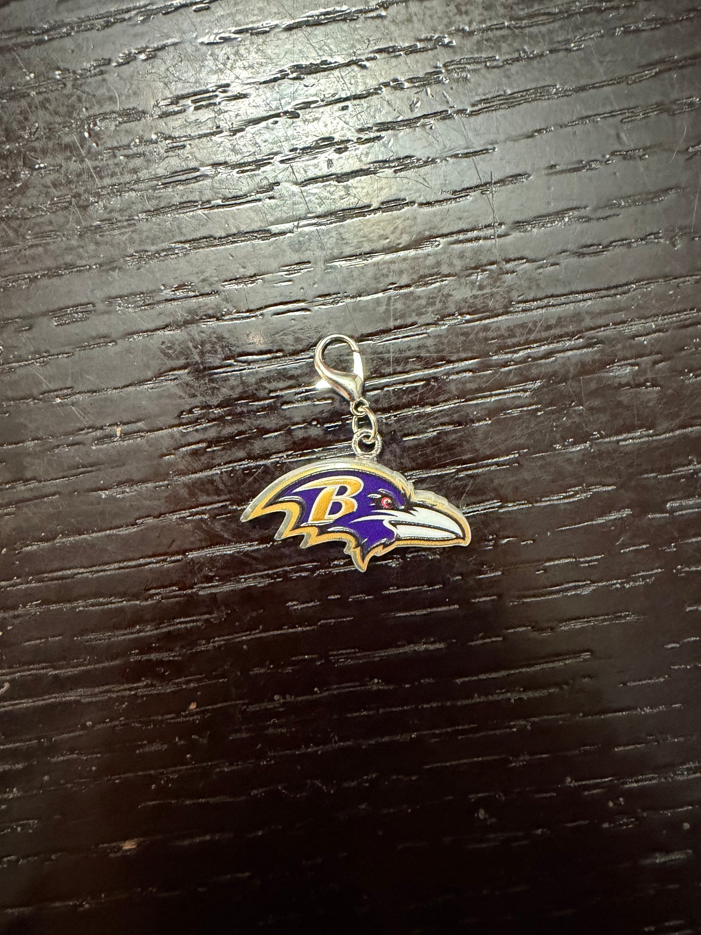 1. ADD A FOOTBALL CHARM