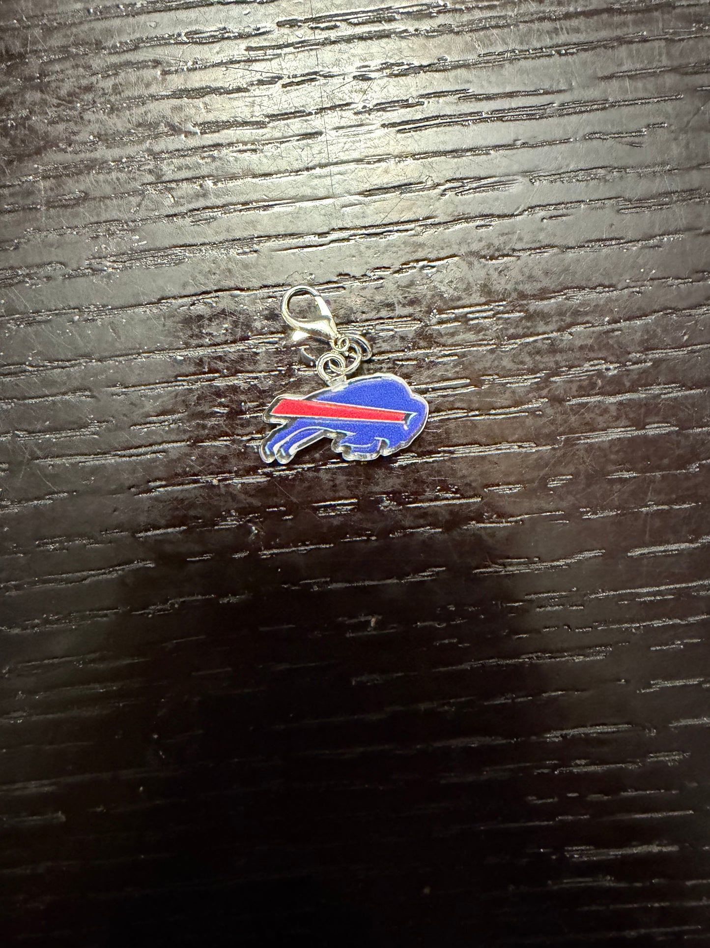 1. ADD A FOOTBALL CHARM