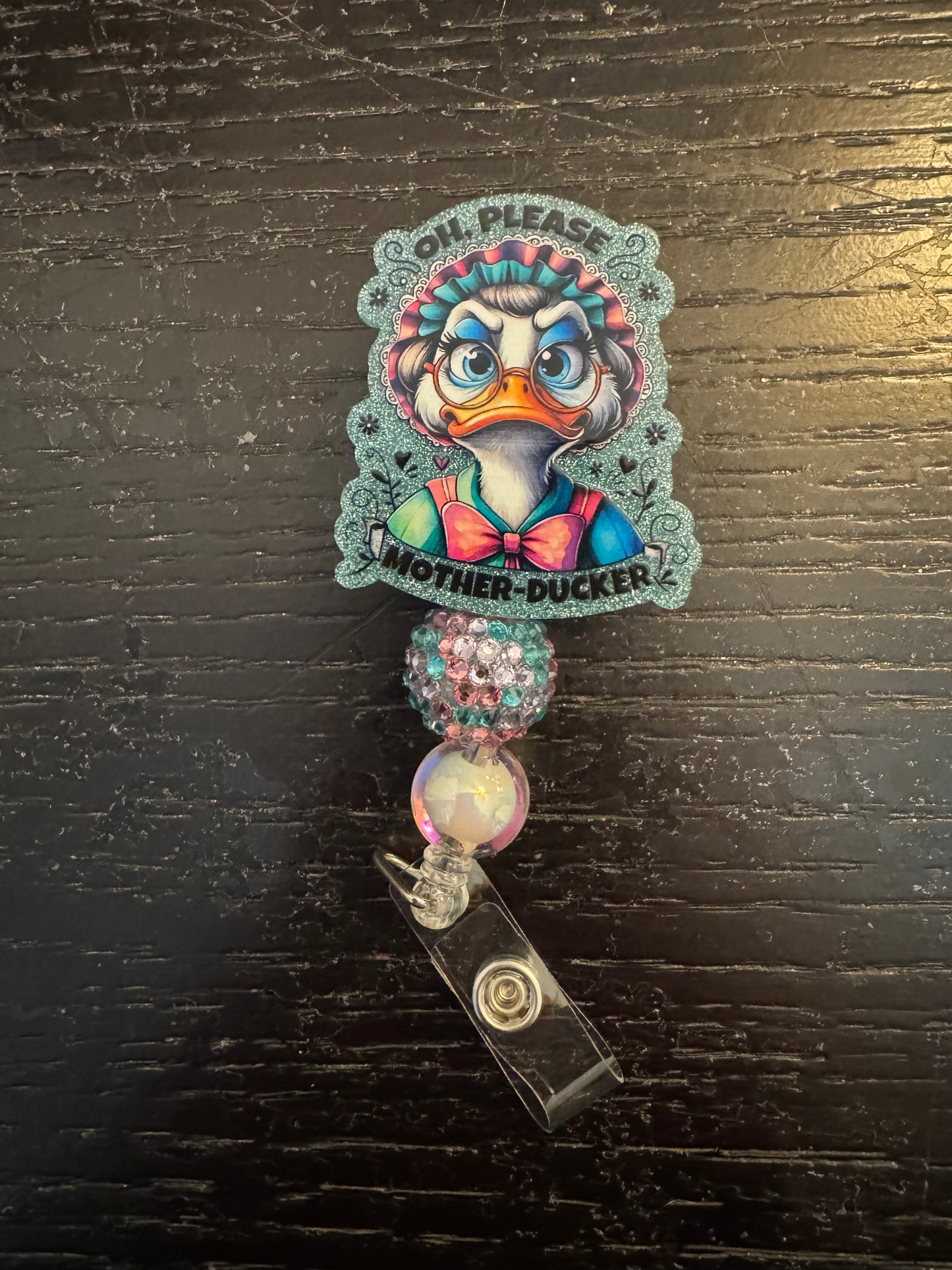 Motherducker badge reel