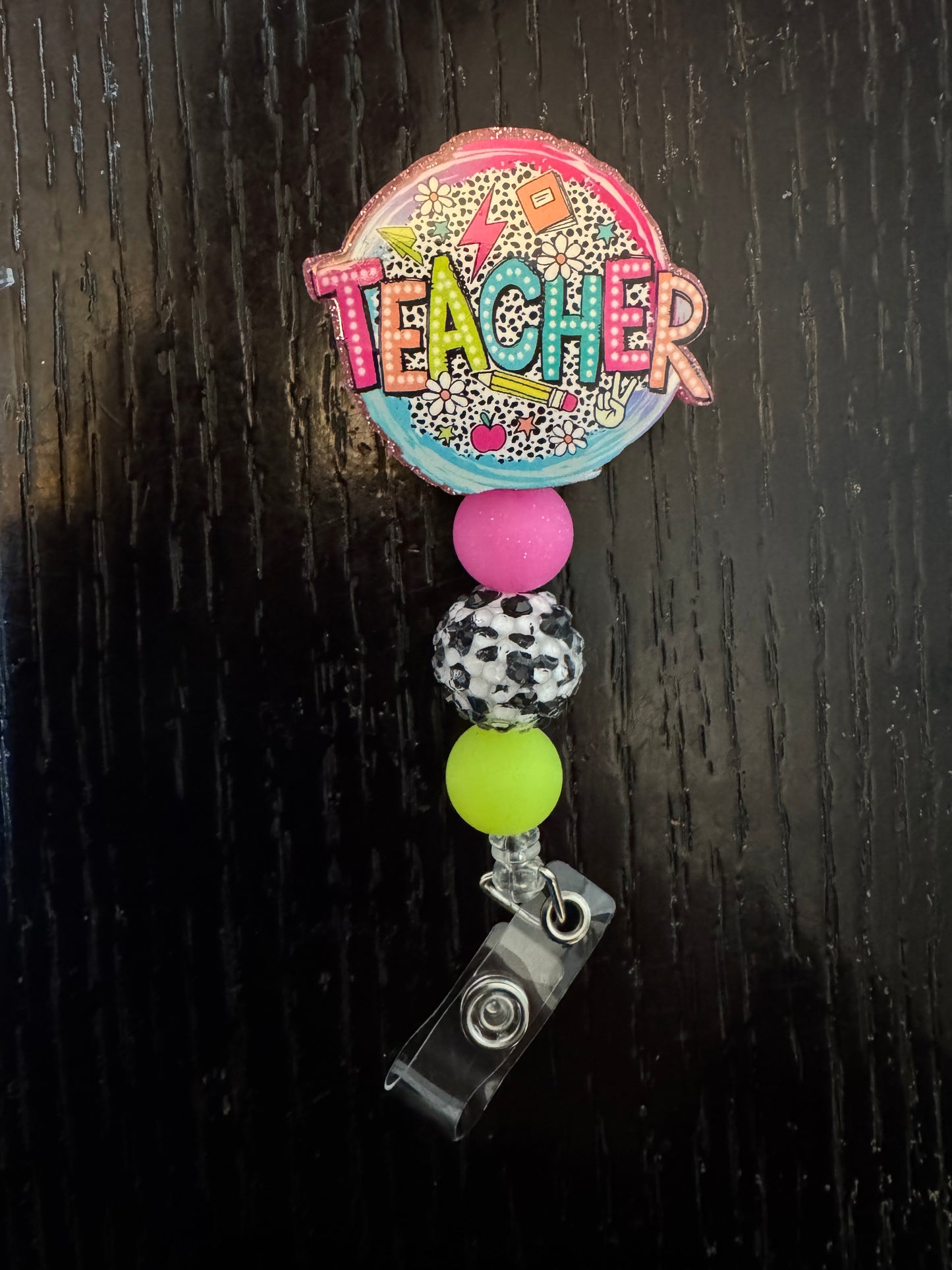 Teacher badge reel