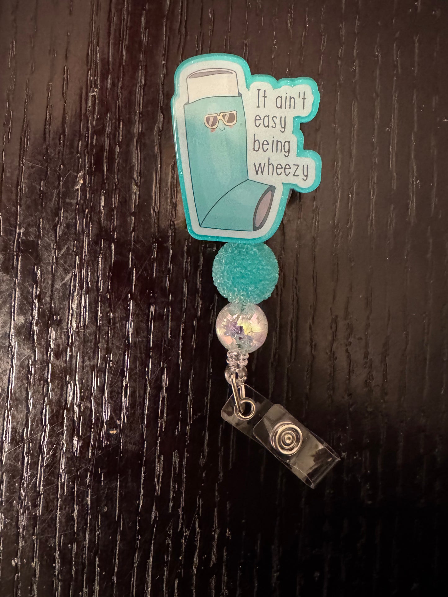 Wheezy badge reel