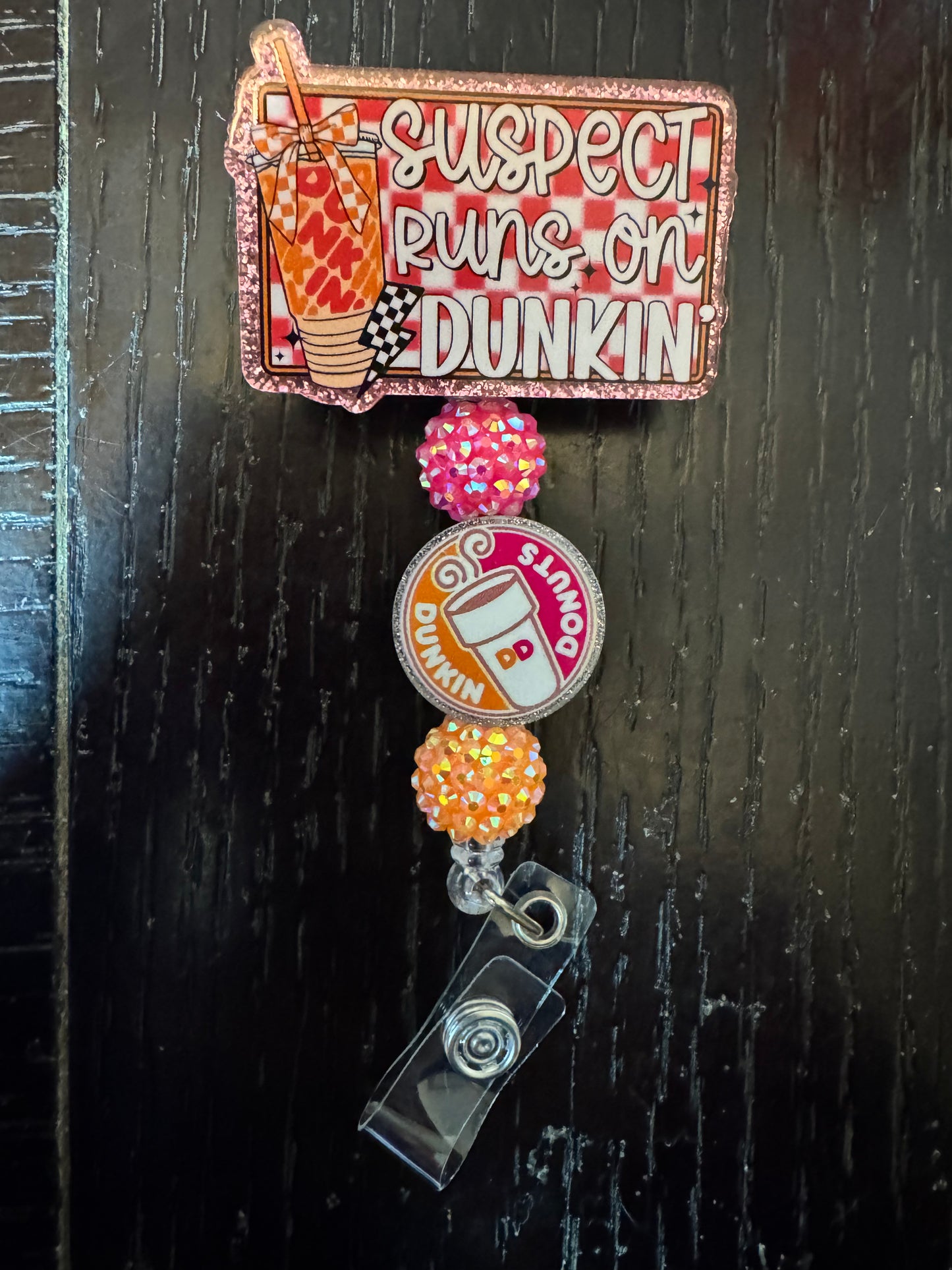 Suspect runs on Dunkin badge reel