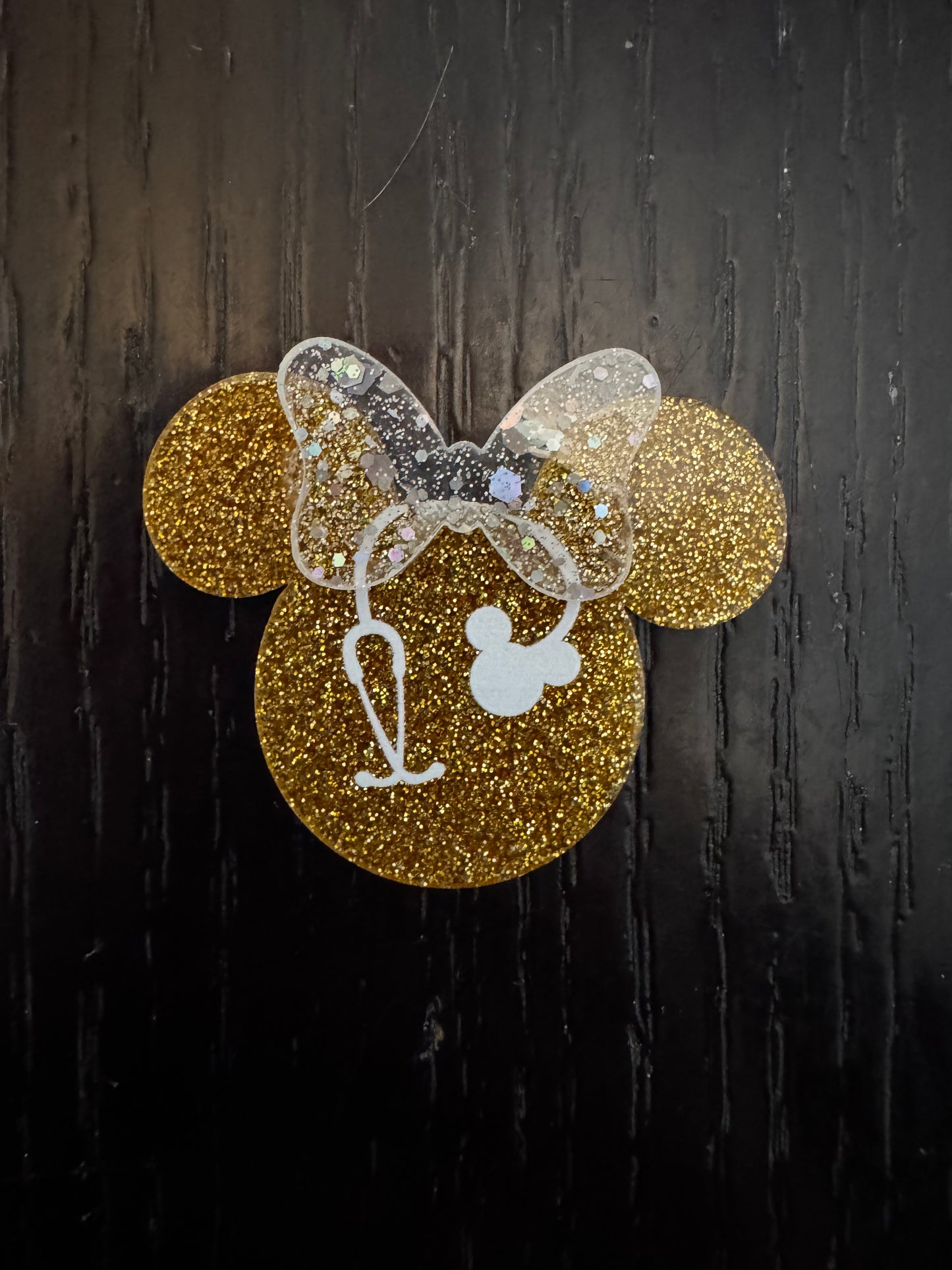 Minnie head badge reel