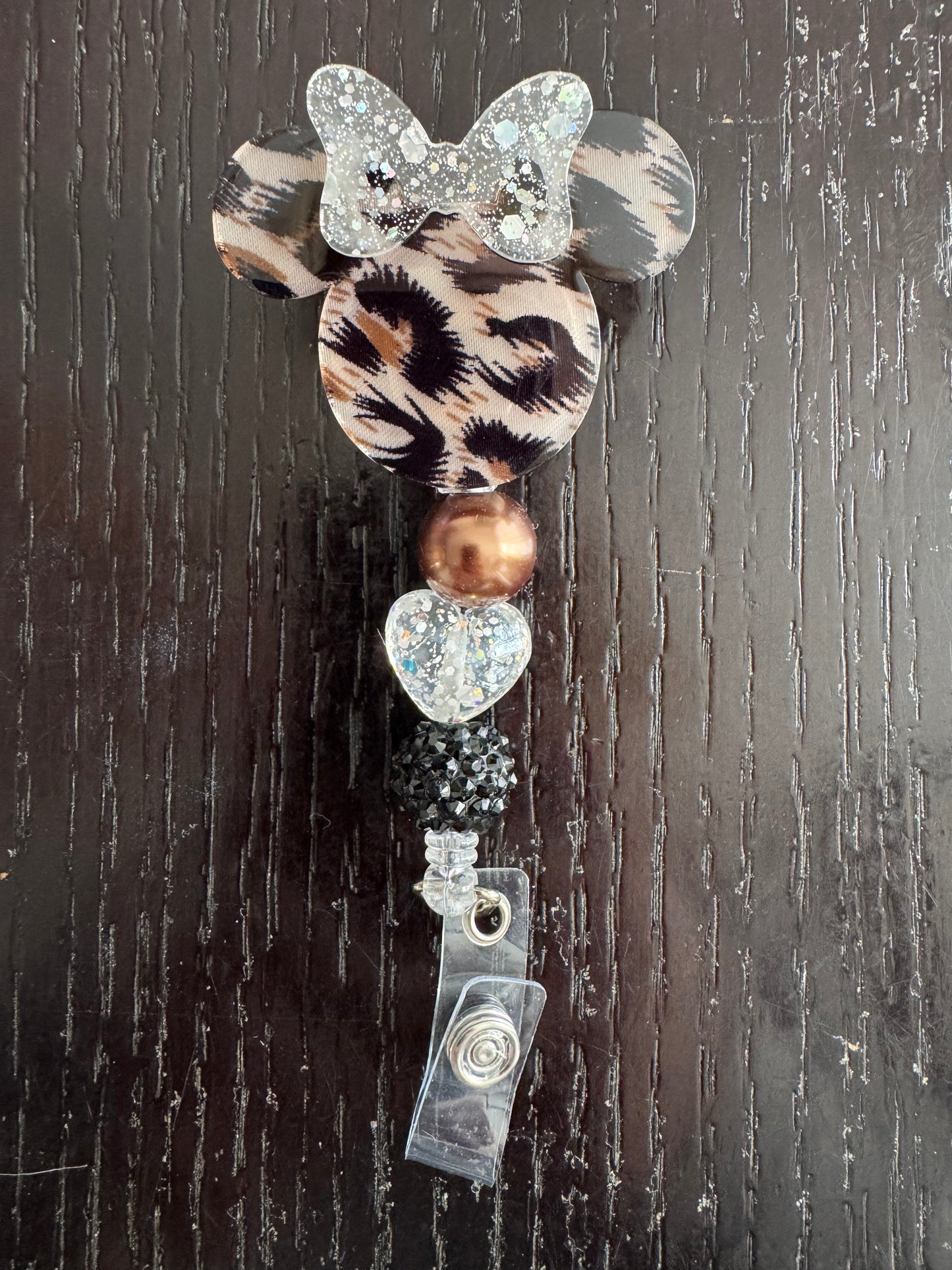 Minnie head badge reel
