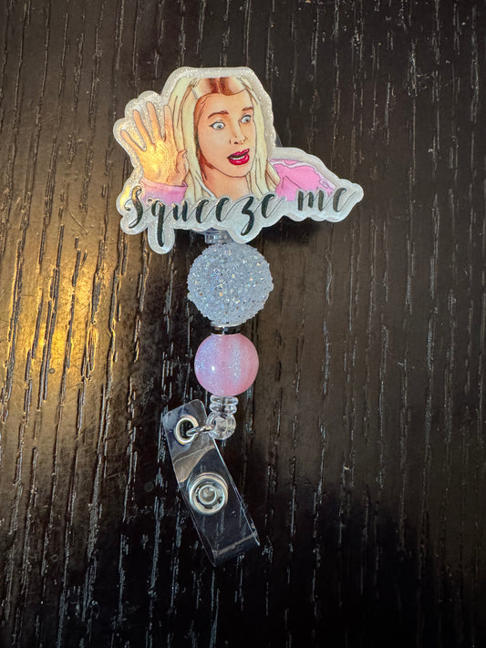 Squeeze me badge reel