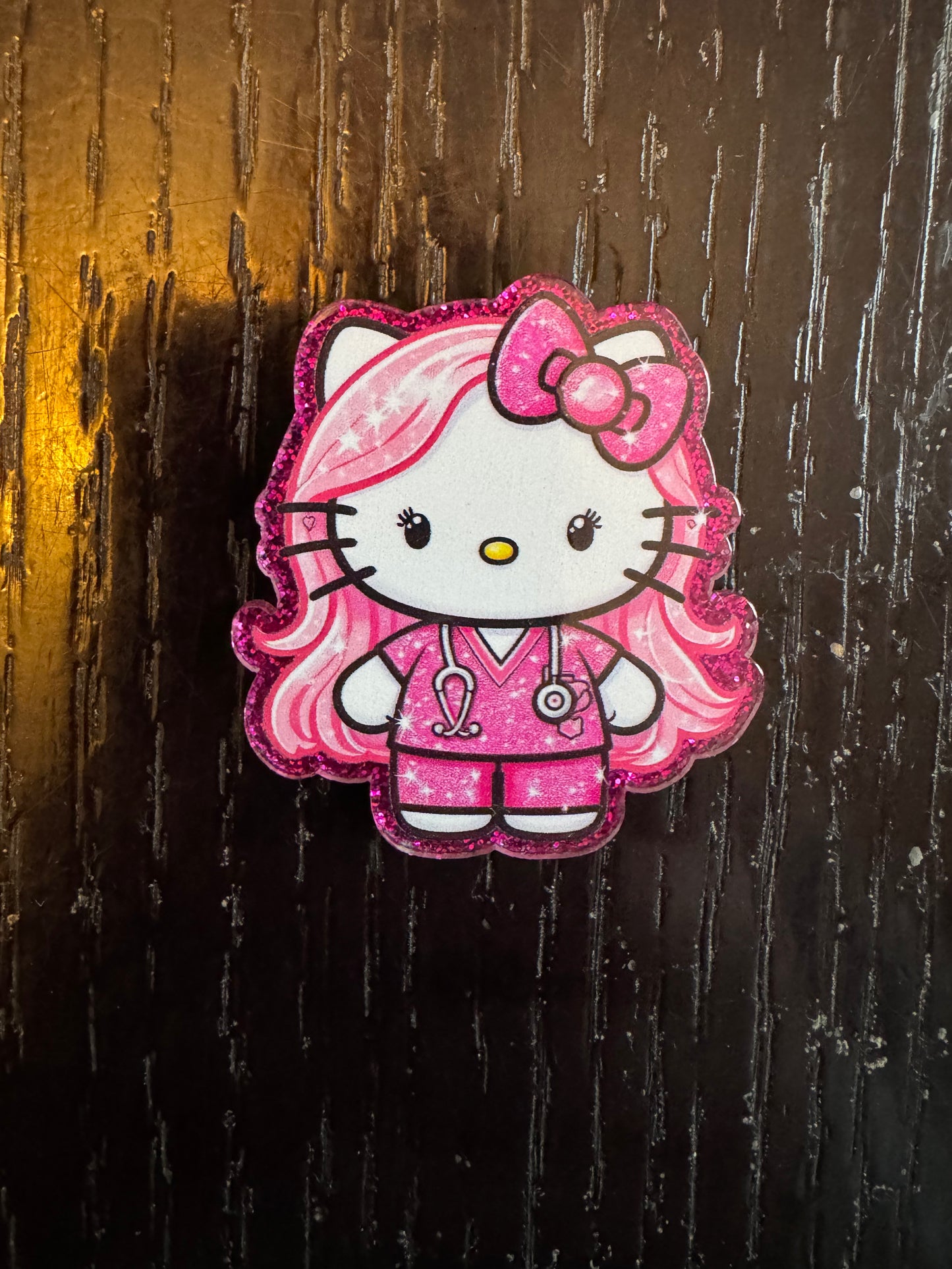 Hello kitty nurse badge reel