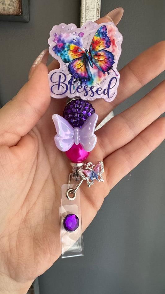 Blessed badge reel