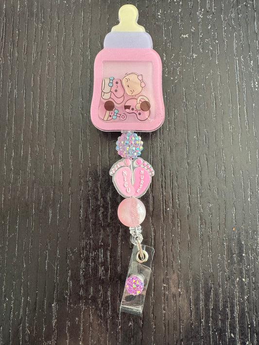 Baby bottle shaker badge reel