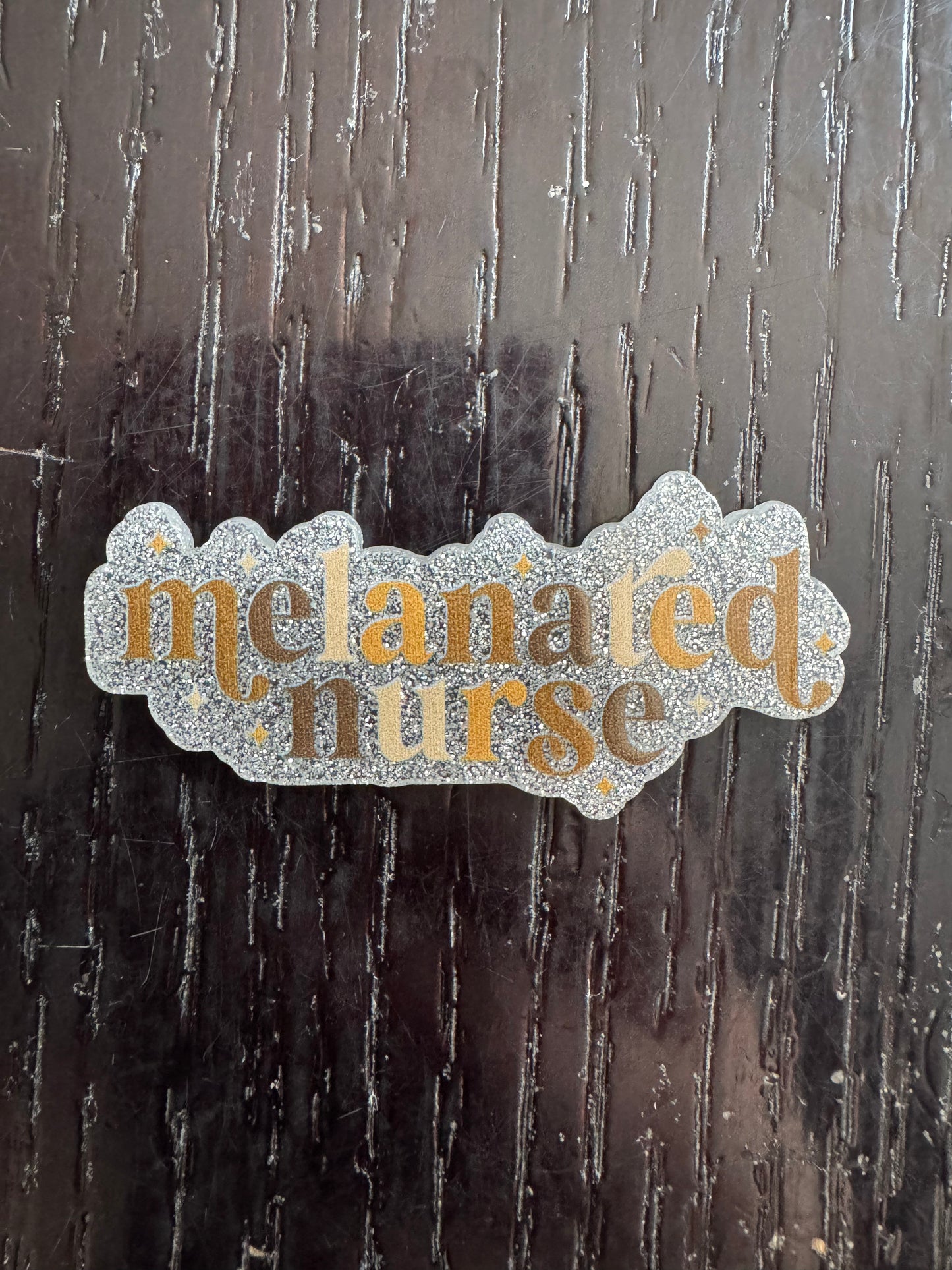 Melanated Nurse badge reel